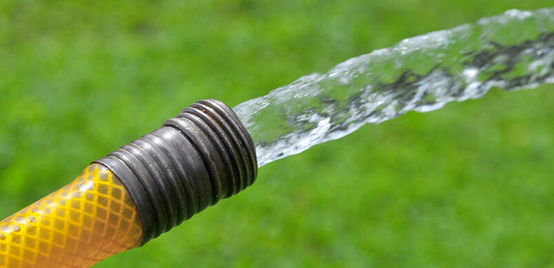 Water Flowing Out Of Hose