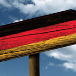 German Flag On Signpost