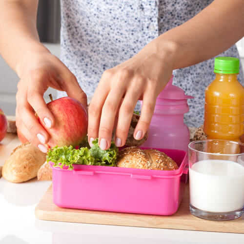 Woman Making Packed Lunch