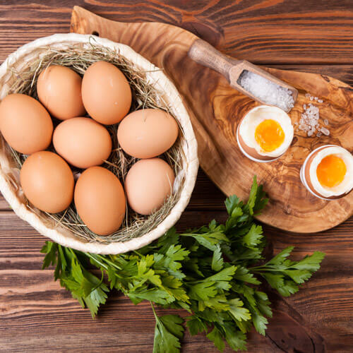 Eggs In Basket And Boiled Eggs