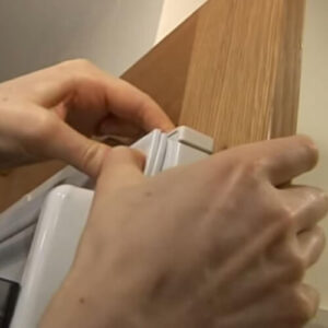 Hands Feeling Fridge Door Seal