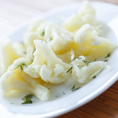 Plate Of Boiled Cauliflower With Herbs