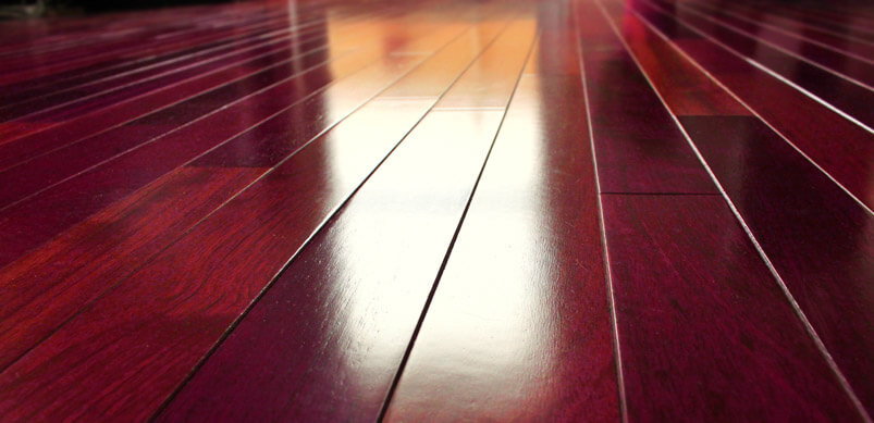 Polished Dark Wooden Floorboards