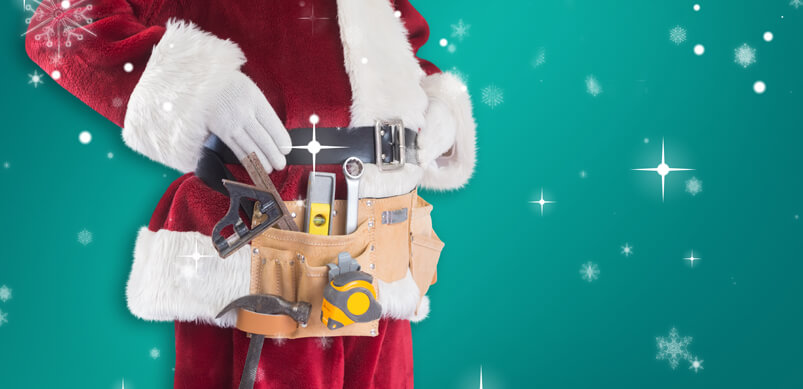 Santa Wearing a Toolbelt To Fix His Appliance