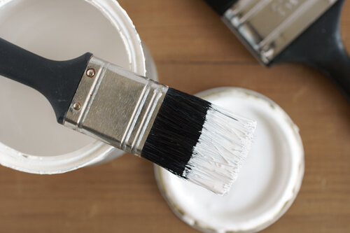 Paintbrush On Open Paint Tin