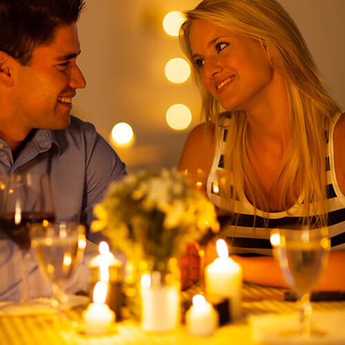 Couple Enjoying a Candlelit Dinner