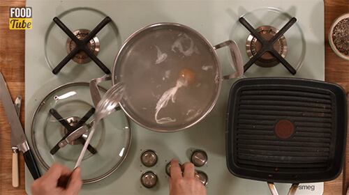 Clingfilm Wrapped Egg In Saucepan