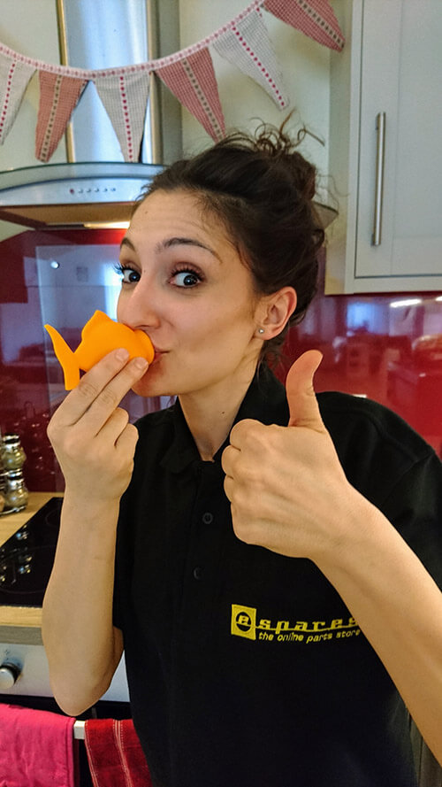 Mariya Posing With Fish Egg Separator