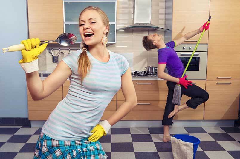 Funny Couple Dancing In Kitchen