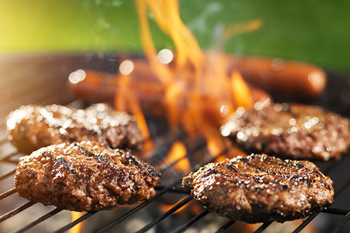 Burgers Cooking On Barbecue