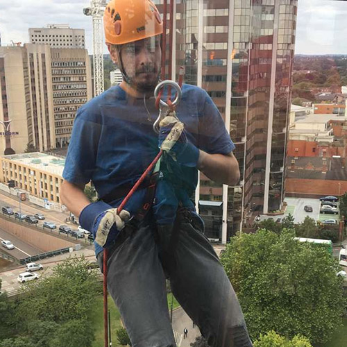 Ben Abseiling Down Window