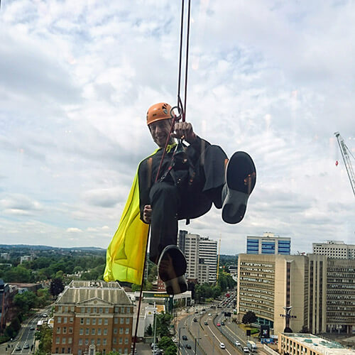 Dan Abseiling Down Window