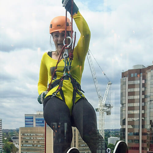 Eleanor Abseiling Down Glass