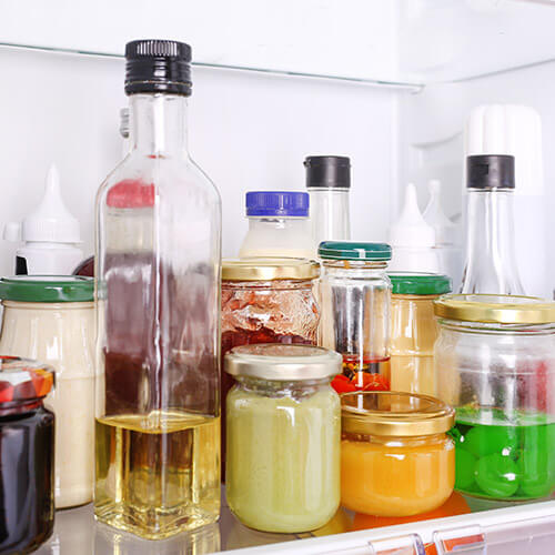 Jars And Condiments In Fridge