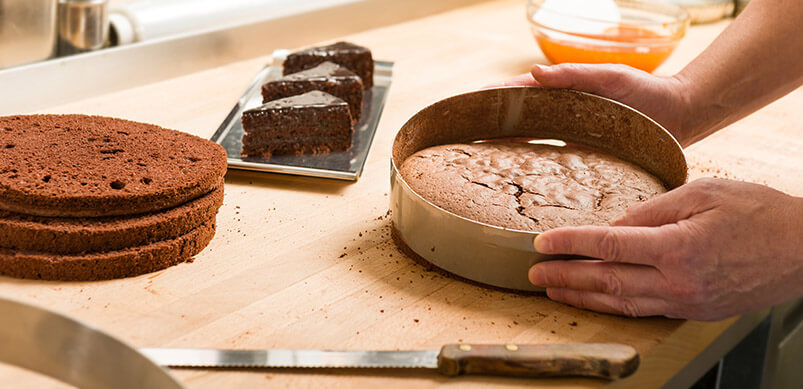 Person Baking Chocolate Cakes