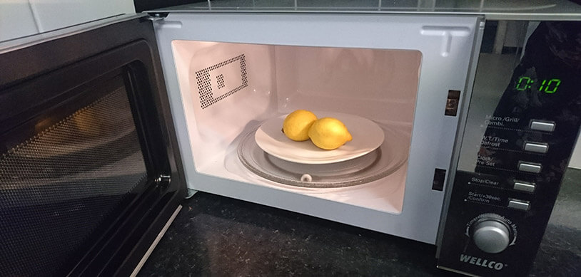 Lemons On Plate In Microwave