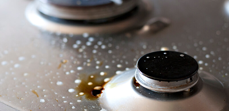 Close-up Of Dirty Oven Stove