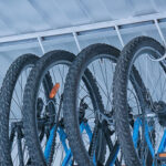 Bicycles Hanging On Ceiling Rack