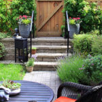 Small Garden With Colourful Plants and Furniture