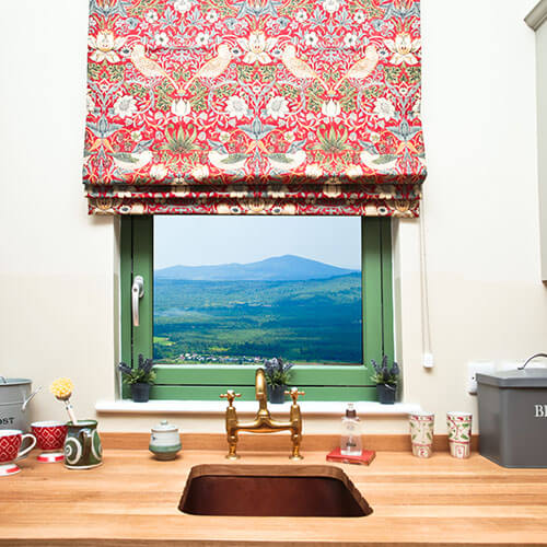 Red Patterned Blind In Kitchen Window