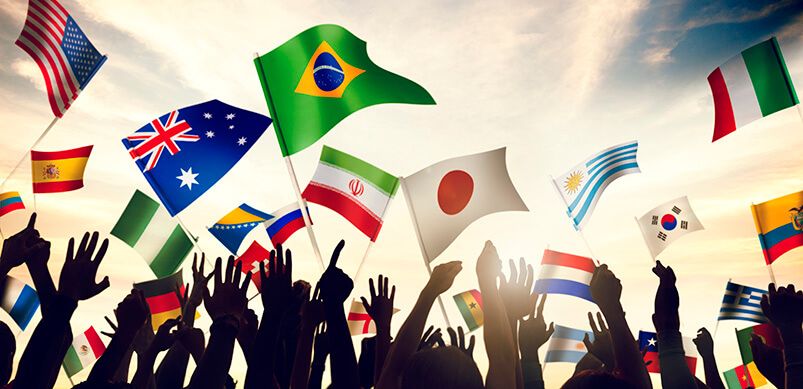 Group of People Waving Flags Of The World