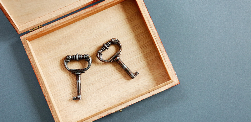 Two Keys In A Wooden Box