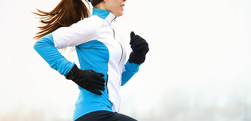 Woman In Sports Clothing Running