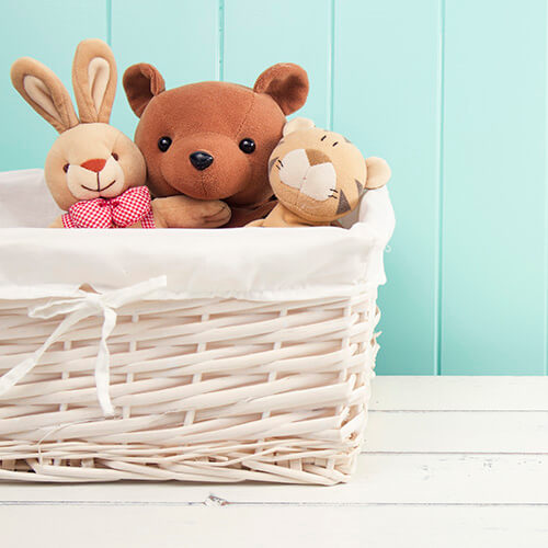 Stuffed Animal Toys In White Basket 