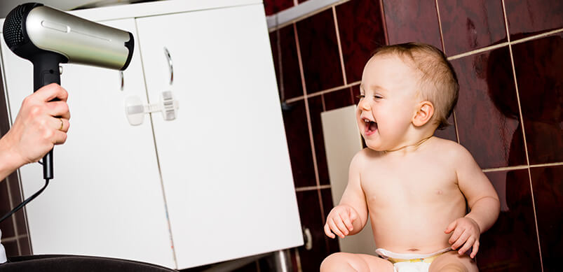 Baby Being Dried With Hairdryer