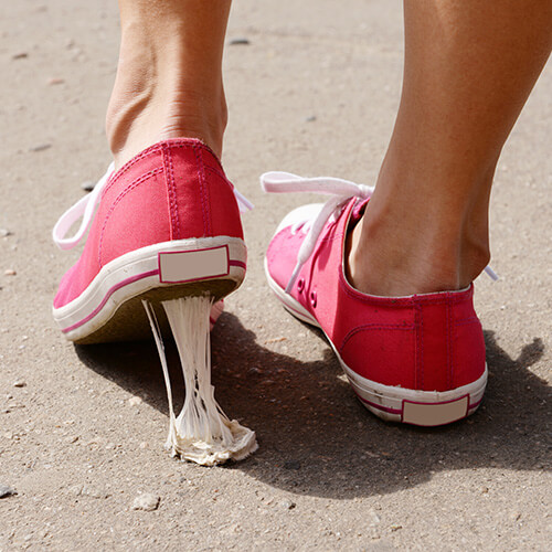 Shoe Stuck In Chewing Gum On Street