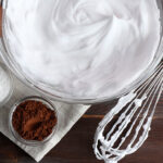 Whipped Cream Inside Bowl With Whisk