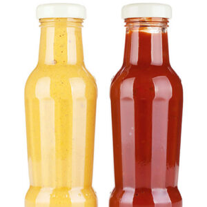 Two Sauces In Glass Bottles