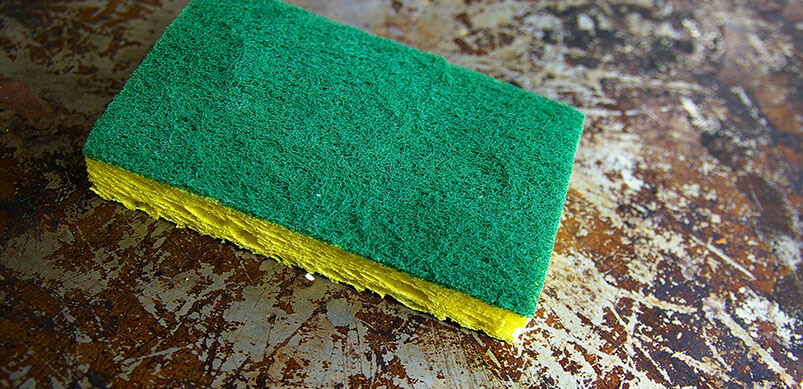 Burnt Pan With Scrub Sponge