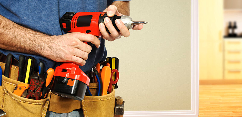 Man Wearing A Belt Full Of Tools