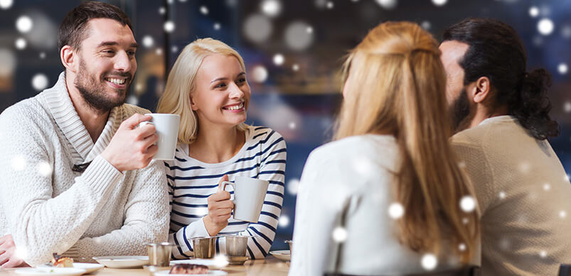 Group Of Friends Talking Over Coffee