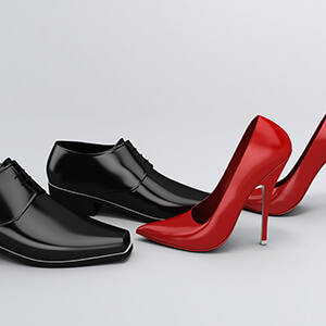 Mens Black Shoes And Womens Red Shoe Together