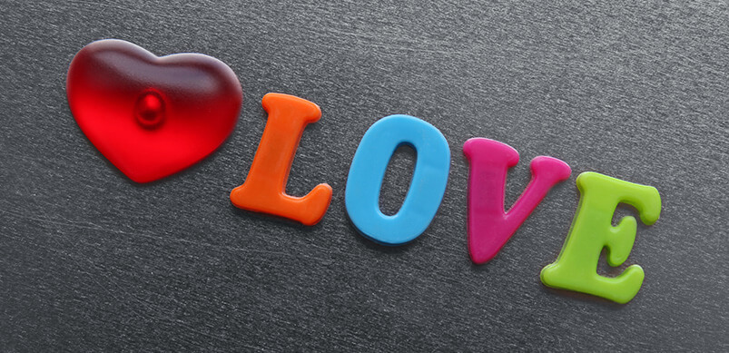 Word Love Spelled With Fridge Magnets