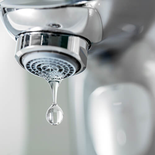 Close Up Of Tap With Dripping Water