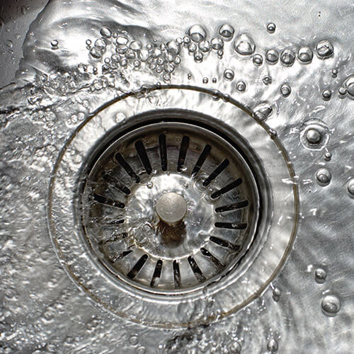 Close Up Of Kitchen Sink With Water Drops