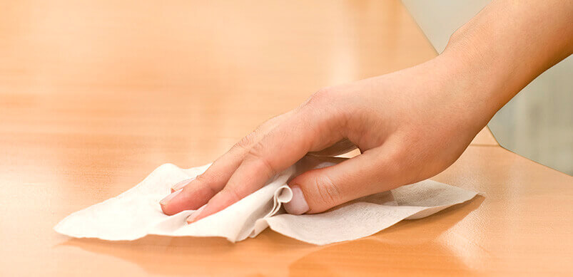 Dryer Sheet Being Used To Polish Wood