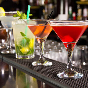 Row Of Cocktails On Bar Counter