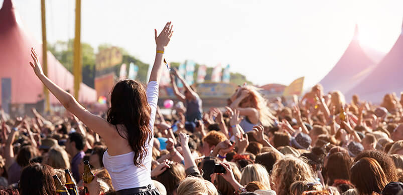 Crowds Cheering At Outdoor Music Festival