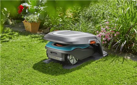 Lawnmower Under Cover In Garden