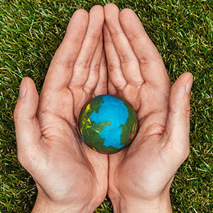 Hands Holding Small Globe