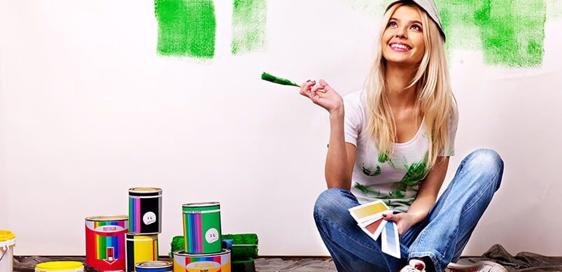 Woman Looking Happy Painting Walls