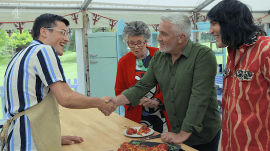 Paul giving Holywood Handshake 