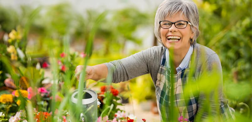 Woman Smiling Doing Gardening