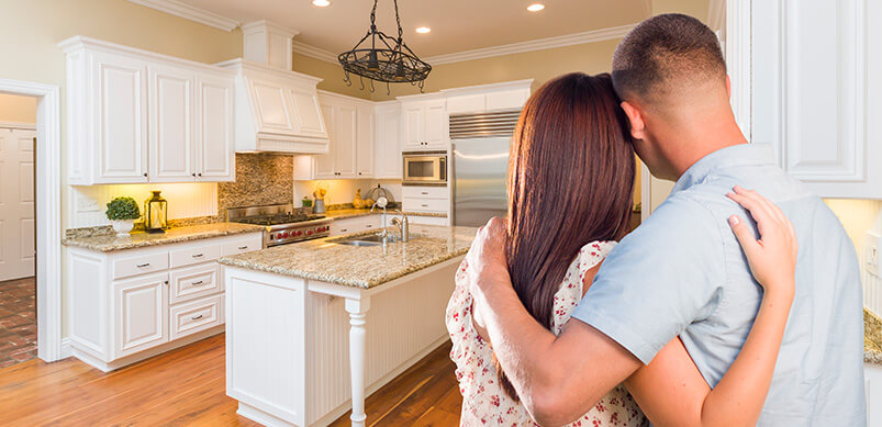 Couple Looking At Kitchen Project