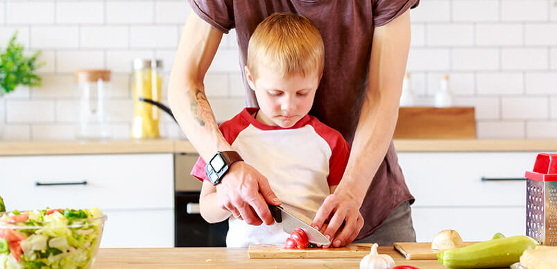 Man Cooking With Son