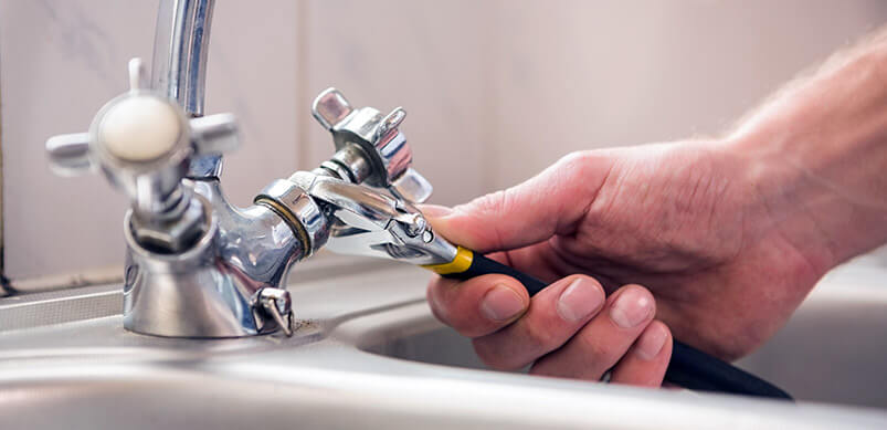 Hand Fixing A Tap